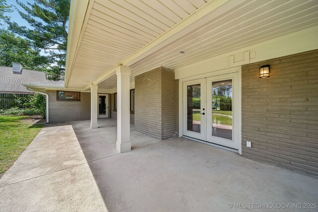 4031 S Birmingham Ave, Tulsa, OK 74105 - view of patio featuring french doors