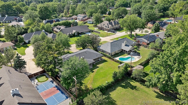 4031 S Birmingham Ave, Tulsa, OK 74105 - aerial view of property's location with a pool and nearby suburban area