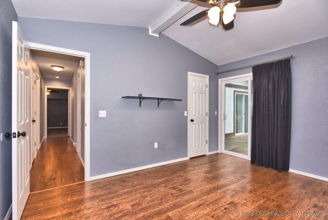 empty room featuring wood finished floors, ceiling fan, and baseboards