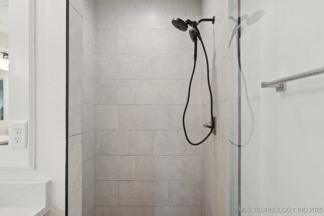 bathroom featuring a shower stall