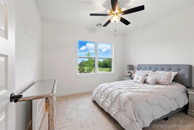 bedroom featuring carpet floors, baseboards, and a ceiling fan