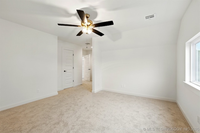 unfurnished bedroom with carpet flooring, baseboards, and ceiling fan