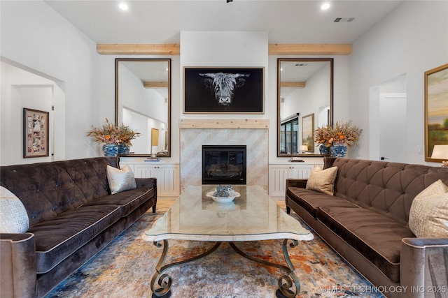 6038 E 119th Pl, Tulsa, OK 74137 - living area with beamed ceiling, a glass covered fireplace, and recessed lighting