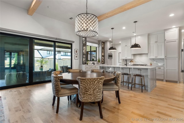6038 E 119th Pl, Tulsa, OK 74137 - dining space featuring beamed ceiling, light wood finished floors, recessed lighting, and a towering ceiling