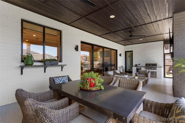 6038 E 119th Pl, Tulsa, OK 74137 - view of patio featuring exterior kitchen and outdoor dining space