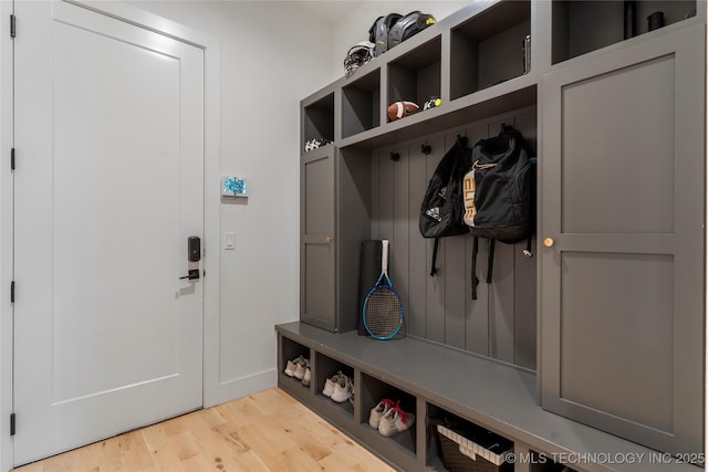 6038 E 119th Pl, Tulsa, OK 74137 - mudroom featuring light wood-type flooring and baseboards