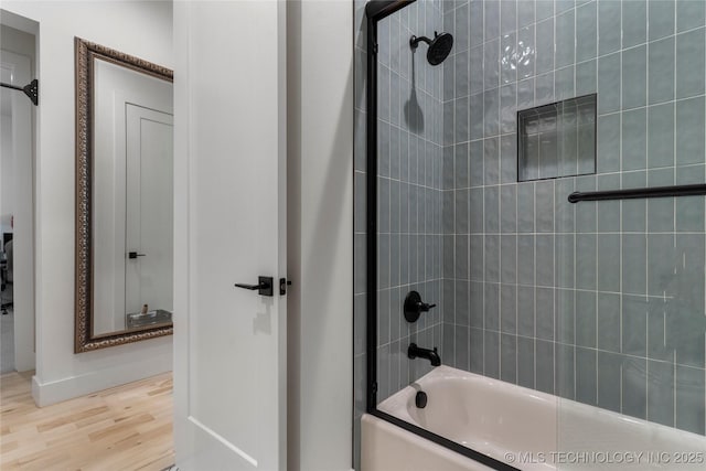 6038 E 119th Pl, Tulsa, OK 74137 - bathroom featuring shower / bath combination and wood finished floors