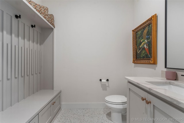 6038 E 119th Pl, Tulsa, OK 74137 - bathroom featuring vanity and speckle patterned floor
