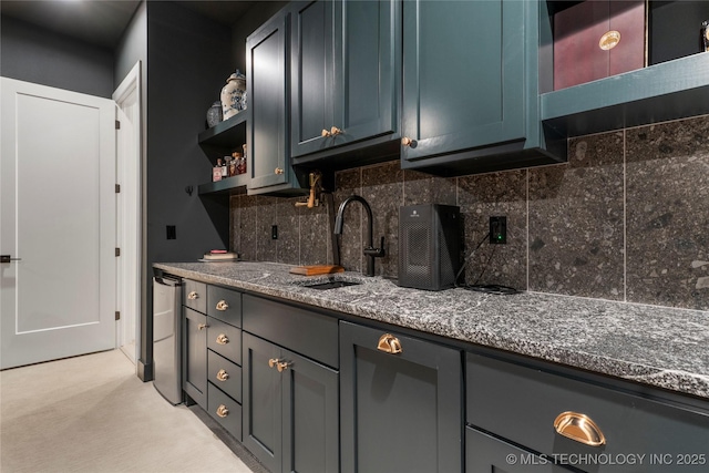 6038 E 119th Pl, Tulsa, OK 74137 - kitchen featuring open shelves, tasteful backsplash, and dark stone countertops