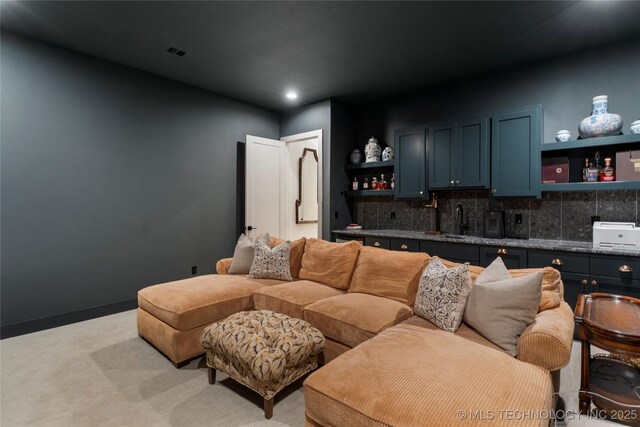 6038 E 119th Pl, Tulsa, OK 74137 - living area featuring wet bar, recessed lighting, and light colored carpet
