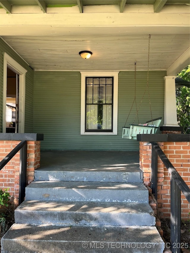 918 W Cedar St, Durant, OK 74701 - view of exterior entry with covered porch
