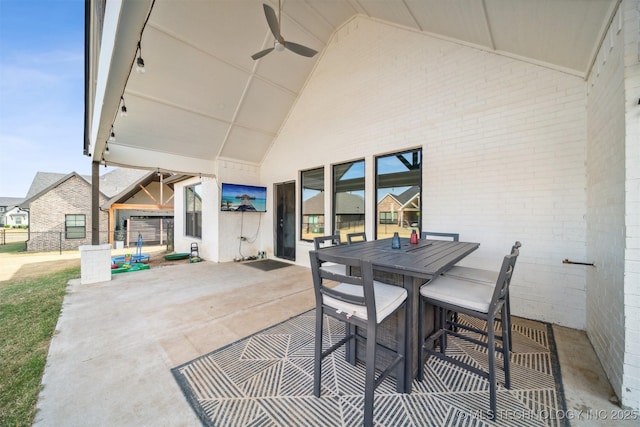 view of patio / terrace with ceiling fan and outdoor dining space