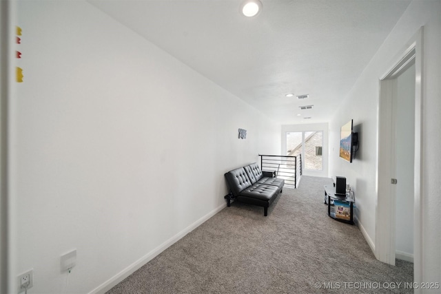 sitting room featuring carpet flooring, baseboards, and recessed lighting