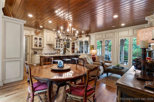 11616 S Hudson Ct, Tulsa, OK 74137 - dining room featuring wood ceiling, a chandelier, light wood-style flooring, and recessed lighting