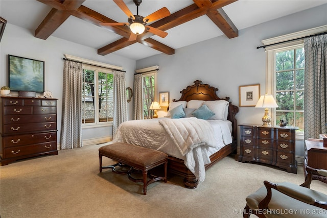 11616 S Hudson Ct, Tulsa, OK 74137 - carpeted bedroom with beam ceiling, multiple windows, coffered ceiling, baseboards, and ceiling fan