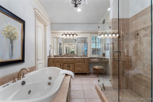 11616 S Hudson Ct, Tulsa, OK 74137 - bathroom with a jetted tub, a shower stall, vanity, a chandelier, and tile patterned floors