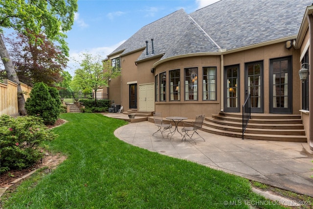 11616 S Hudson Ct, Tulsa, OK 74137 - rear view of property with entry steps, stucco siding, a shingled roof, and a patio area