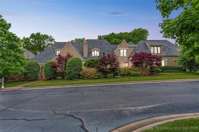 11616 S Hudson Ct, Tulsa, OK 74137 - view of front of house featuring a chimney, stucco siding, and a high end roof