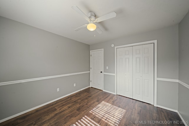 4719 S 194th E Ave, Broken Arrow, OK 74014 - unfurnished bedroom featuring dark wood-style floors, baseboards, a closet, and ceiling fan