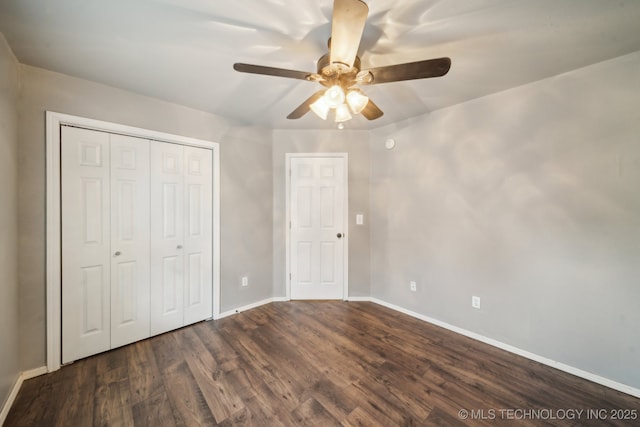 4719 S 194th E Ave, Broken Arrow, OK 74014 - unfurnished bedroom featuring dark wood-style floors, baseboards, a closet, and a ceiling fan
