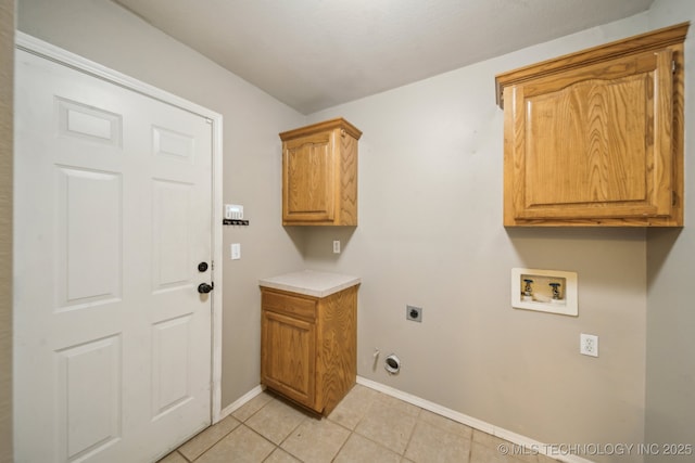 4719 S 194th E Ave, Broken Arrow, OK 74014 - washroom with hookup for a washing machine, electric dryer hookup, cabinet space, baseboards, and light tile patterned floors