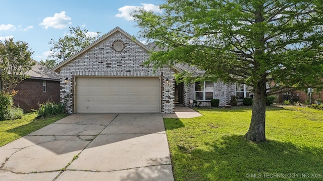 4719 S 194th E Ave, Broken Arrow, OK 74014 - view of front facade featuring an attached garage, concrete driveway, brick siding, and a front yard