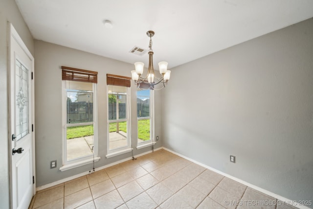 4719 S 194th E Ave, Broken Arrow, OK 74014 - unfurnished room featuring a chandelier and baseboards