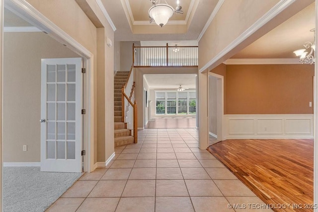 8531 S 70th E Ave, Tulsa, OK 74133 - entrance foyer featuring a chandelier, stairs, ornamental molding, and light tile patterned floors