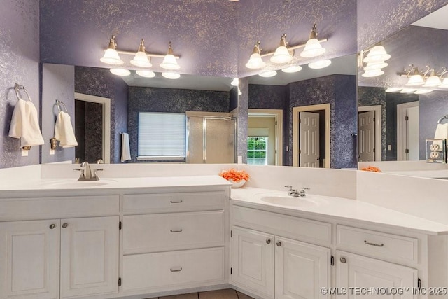 8531 S 70th E Ave, Tulsa, OK 74133 - full bathroom with wallpapered walls, vanity, and a shower stall