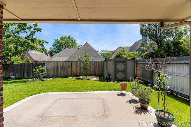 8531 S 70th E Ave, Tulsa, OK 74133 - view of patio / terrace with a storage unit and an outdoor structure