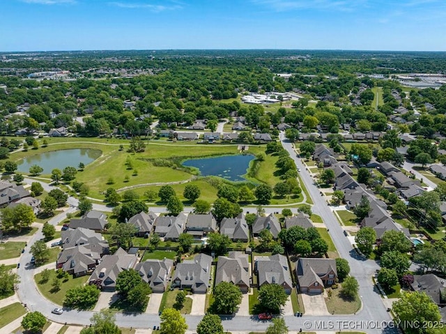8531 S 70th E Ave, Tulsa, OK 74133 - aerial perspective of suburban area featuring a large body of water