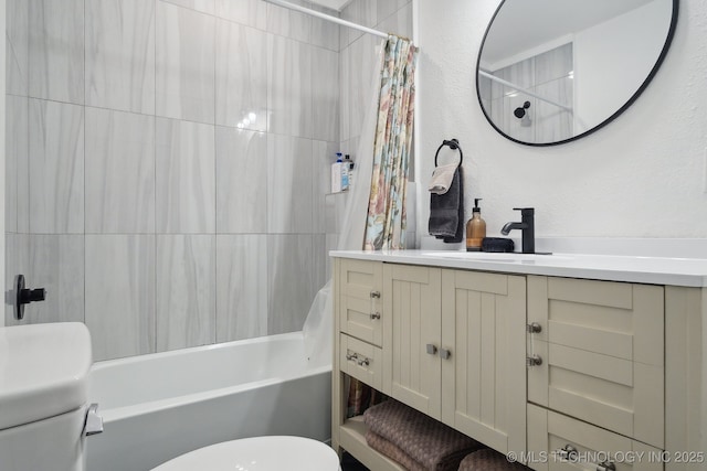 bathroom with toilet, shower / bath combination with curtain, and vanity
