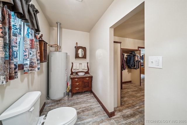 6019 E 620th Rd W, Locust Grove, OK 74352 - bathroom with water heater and toilet