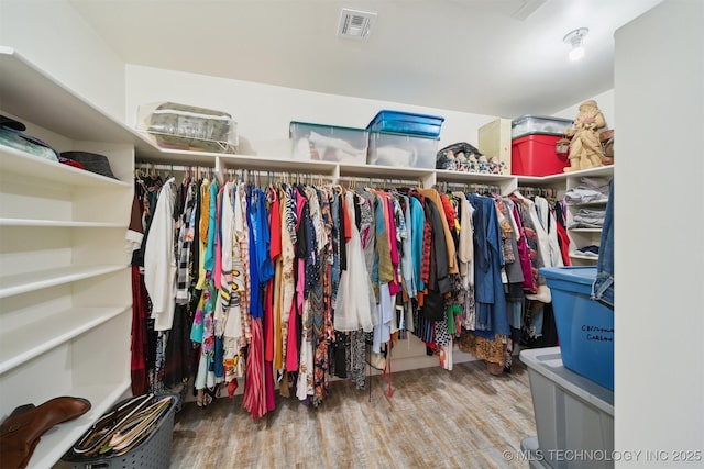 6019 E 620th Rd W, Locust Grove, OK 74352 - walk in closet with wood finished floors