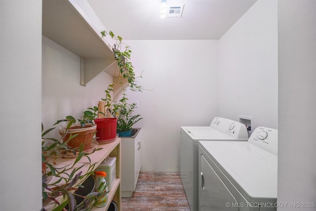 6019 E 620th Rd W, Locust Grove, OK 74352 - washroom featuring washer and clothes dryer and light wood-type flooring