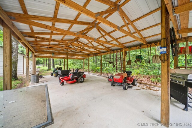 6019 E 620th Rd W, Locust Grove, OK 74352 - view of patio with a carport and an outdoor structure