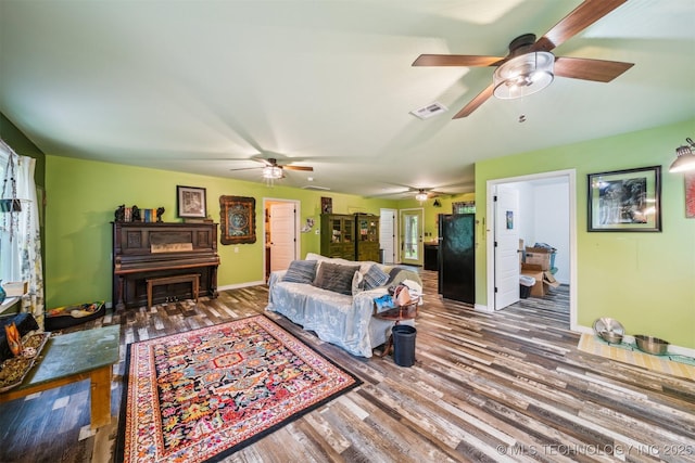 6019 E 620th Rd W, Locust Grove, OK 74352 - living room with ceiling fan, wood finished floors, and baseboards