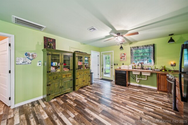 6019 E 620th Rd W, Locust Grove, OK 74352 - office featuring dark wood finished floors, a ceiling fan, baseboards, and a sink