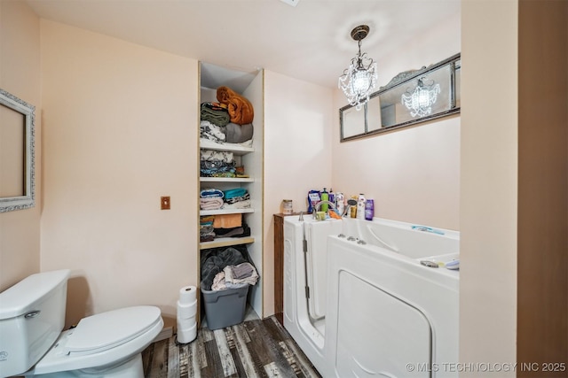 6019 E 620th Rd W, Locust Grove, OK 74352 - bathroom featuring toilet and wood finished floors