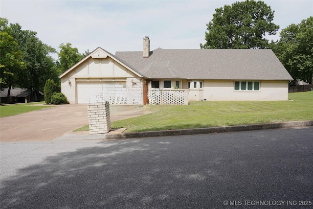 5941 E 87th St, Tulsa, OK 74133 - single story home featuring concrete driveway, brick siding, a front yard, a chimney, and a garage