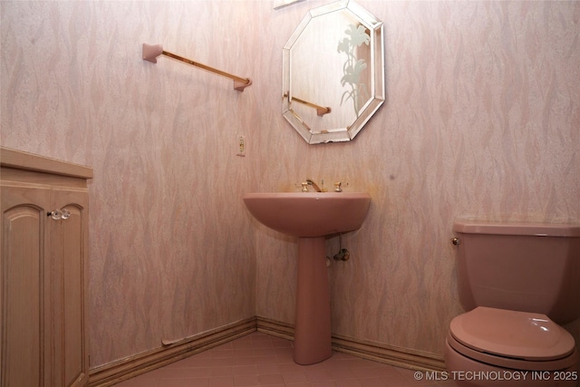 5941 E 87th St, Tulsa, OK 74133 - bathroom featuring tile patterned floors and toilet