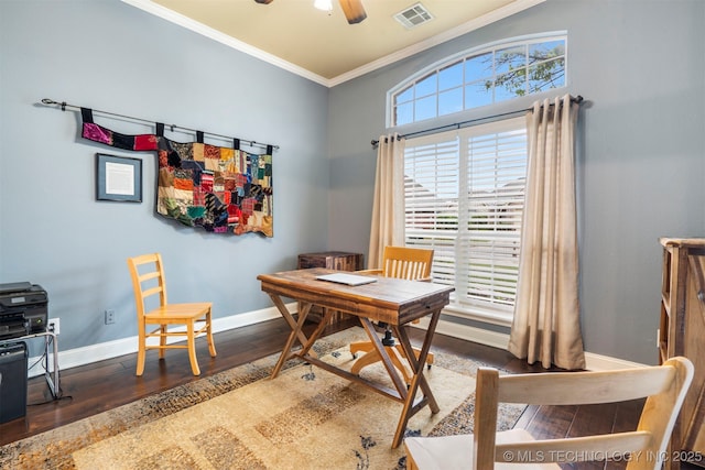 office area with ornamental molding, wood finished floors, baseboards, and ceiling fan