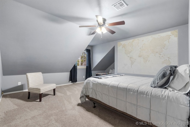 bedroom with carpet, lofted ceiling, baseboards, and a ceiling fan