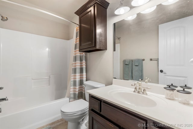 bathroom with toilet, shower / tub combo with curtain, and vanity
