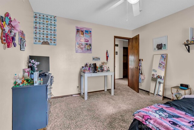 1205 Beaverly, Ardmore, OK 73401 - bedroom featuring carpet floors, baseboards, and a ceiling fan