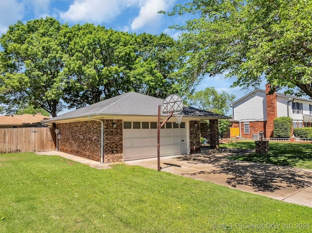 1205 Beaverly, Ardmore, OK 73401 - view of front of home featuring an attached garage, concrete driveway, and brick siding