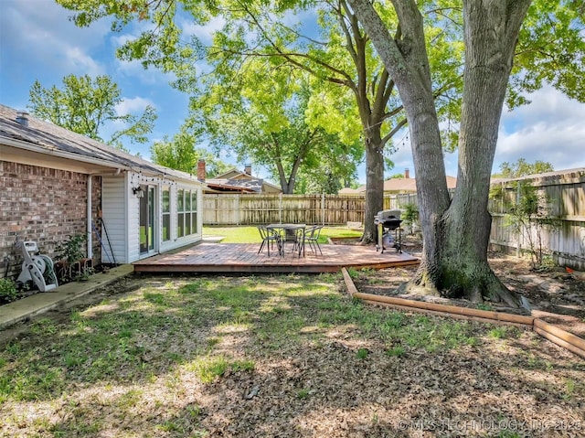 1205 Beaverly, Ardmore, OK 73401 - view of yard with a wooden deck