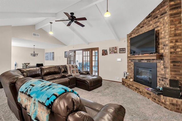 1205 Beaverly, Ardmore, OK 73401 - carpeted living room featuring ceiling fan, a brick fireplace, and baseboards