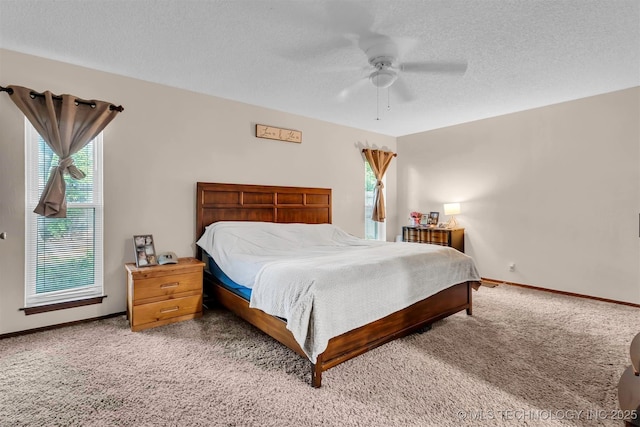 1205 Beaverly, Ardmore, OK 73401 - bedroom with light colored carpet, a textured ceiling, baseboards, and a ceiling fan