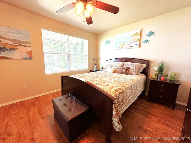 114537 Spring Creek Rd, Eufaula, OK 74432 - bedroom with wood finished floors, baseboards, and ceiling fan
